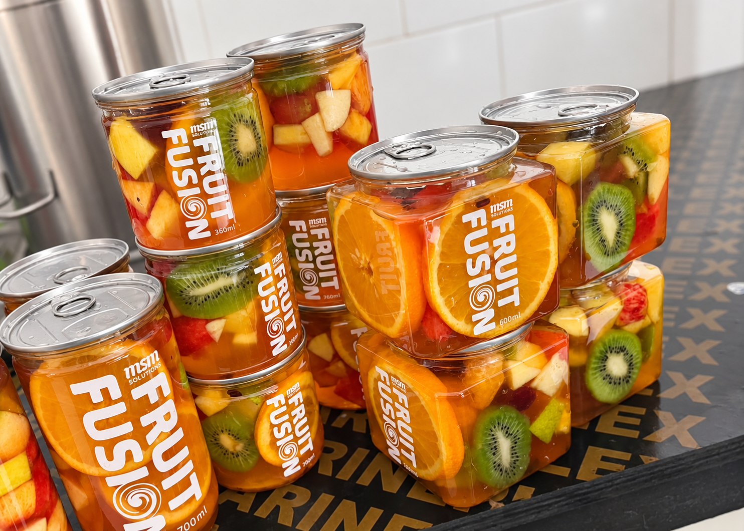 Fruit Fusion branded jars with mixed fruit and silver lids